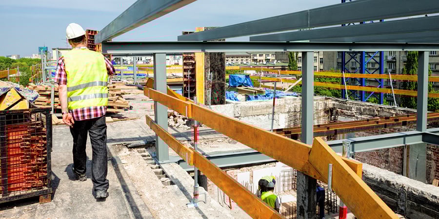 Construction of a modern building and a skyscraper