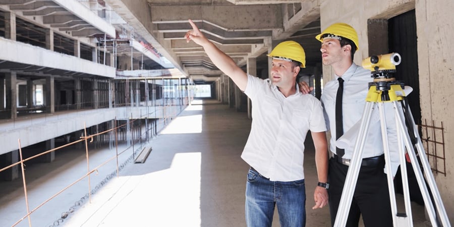 Team of business people in group, architect and engeneer on construciton site check documents and business workflow on new building