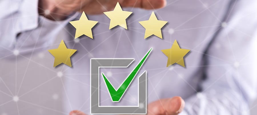 Five gold stars with a check mark